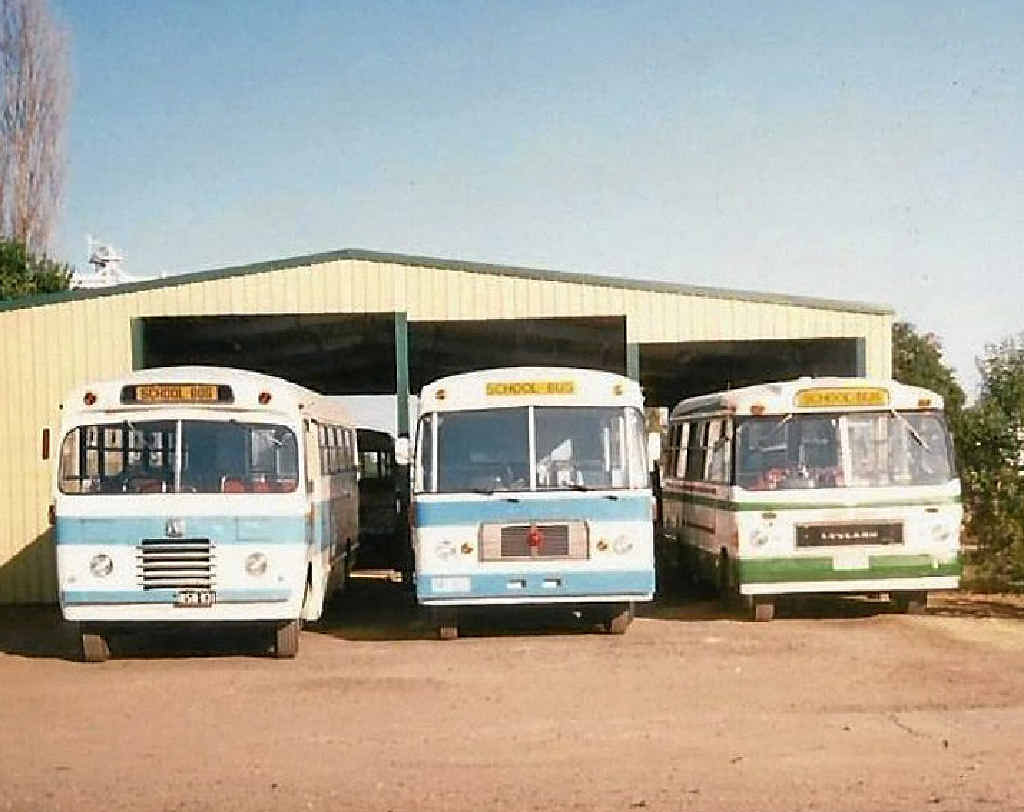 NEW DIGS: Col and Bette Gay’s Allora bus service fleet in 1991, after the construction of the service’s new shed.